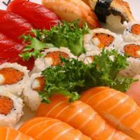 Deluxe Sushi · 12 pcs sushi and spicy tuna roll.