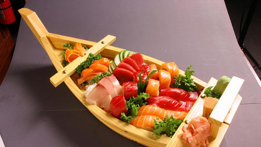 Panama Boat · 12 pcs sashimi, 4 pcs sushi, and rainbow roll.