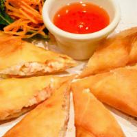 Crab Rangoon · Mixed crab meat, cream cheese, 
wrapped in spring roll skin served with
 Thai sweet and sour...