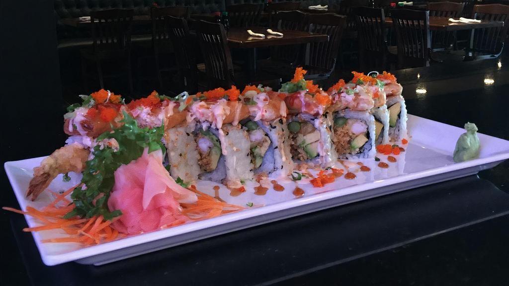 Red Dragon Roll · Shrimp tempura and avocado topped with spicy tuna mix and masago served with eel and spicy mayo sauce.