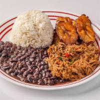 Pabellon Criollo · Shredded beef, yellow plantains, black beans & white rice.