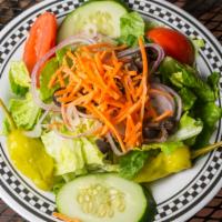 Garden · Romaine lettuce with tomatoes, cucumbers, red onion, sliced black olives, pepperoncini, and ...
