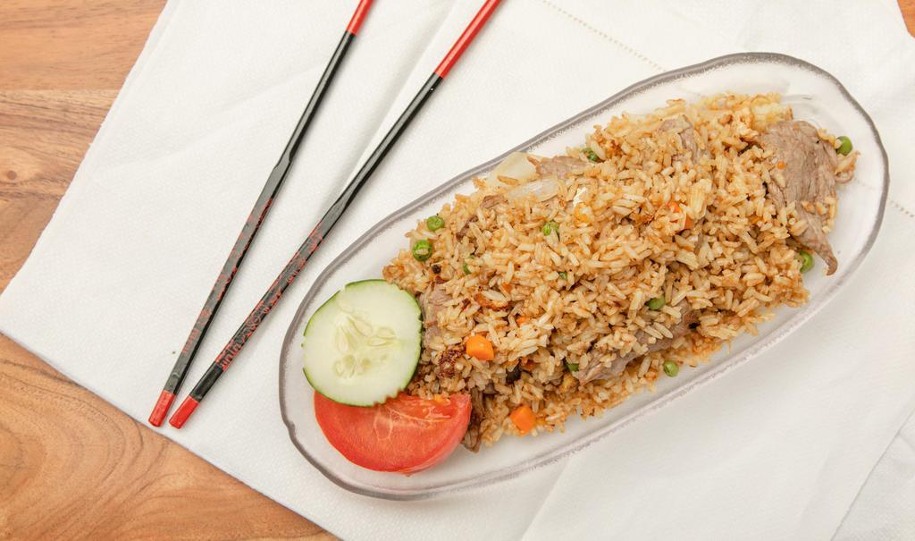 Vegetable Fried Rice · Fried rice with eggs and vegetables.