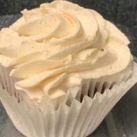 Vanilla/Vanilla Cupcake · A Vanilla cupcake with vanilla buttercream frosting and seasonal sprinkles.