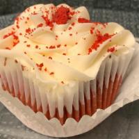 Red Velvet Cupcake · A red velvet cupcake with cream cheese frosting topped with red velvet crumbles. One of our ...