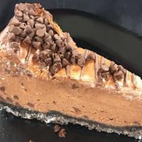 Death By Chocolate Cheesecake · Supremely chocolate-y cheesecake slice with chocolate chips, chocolate Oreo crust, and a cho...