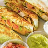 Big Chicken And Veggies Quesadilla · Chicken breast, onions, tomato, bell pepper and cheddar cheese.
