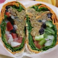 Patty Wrap · Spread of roasted bell pepper hummus, veggie patty, tomato, bell pepper and onion, tossed wi...