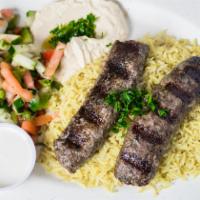 Kufta Kabob · Minced beef and lamb herbs spices, parsley, and onions grilled over an open fire grill