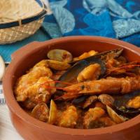 Mariscos En Salsa Especial De La Casa / Seafood In  Special House Sauce · 