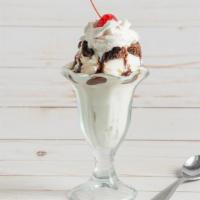 Brownie Sundae · Your choice of ice cream topped with chocolate syrup, whipped cream, cherry, and nuts. Brown...