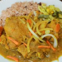 Curry Chicken (Cc) · Served with rice and peas or white rice and cabbage.