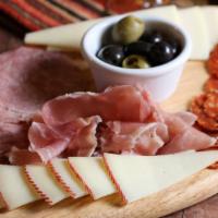 Picada Porteña · Assorted Cured Meats, Manchego &
Asiago Cheese with Olives
