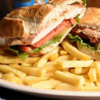 Sandwich De Pollo · Grilled Chicken Breast Fillet on French Bread with Lettuce, Tomato & Mayo