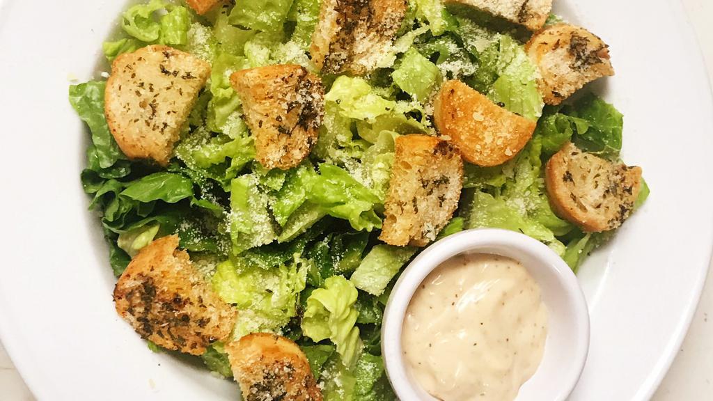 Ensalada Caesar · Caesar Salad.
