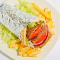 Gyro Sandwich · Generous portion of gyro meat with lettuce, tomatoes, onion and pickles with cucumber sauce,...