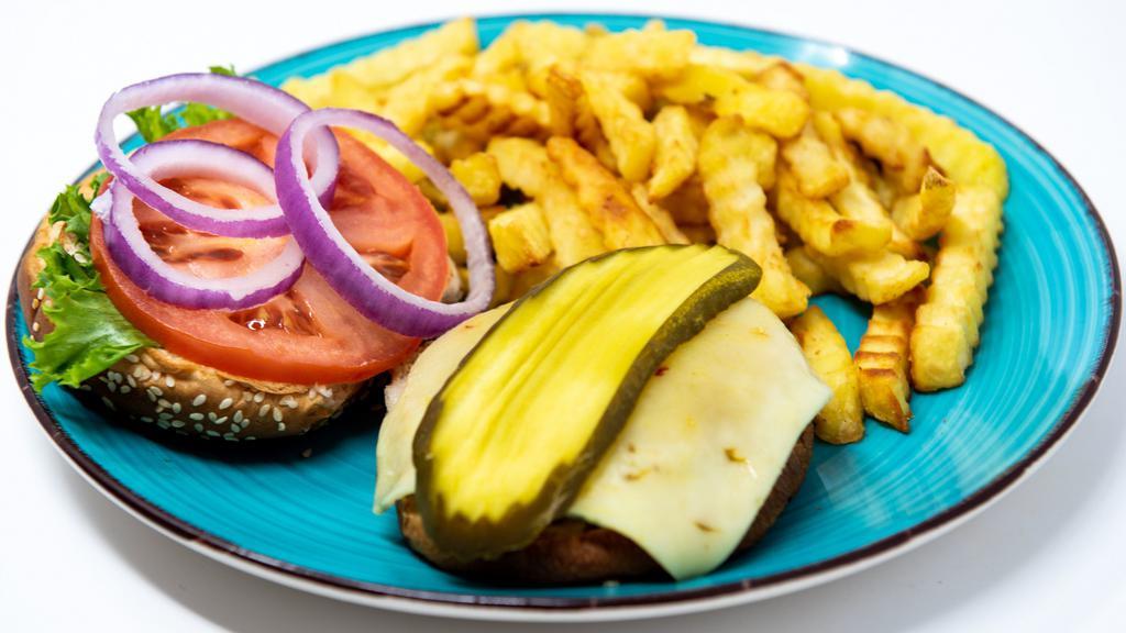 Turkey Burger With Fries · Served with Lettuce, tomatoes, pickles, mayo, mustard, pepper Jack cheese, and onions.