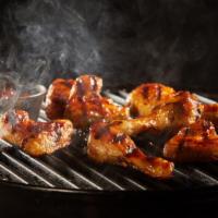 Bbq Wings · Classic, bone-in wing oven-baked, cooked to order perfectly crisp chicken wings tossed in ou...