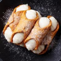 Cannoli · Italian pastry shell filled with sweetened ricotta cheese, and chocolate bits.