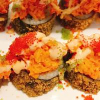(Spr14) Volcano Roll · Spicy tuna, avocado in tempura, spicy krab top, with spicy mayo and tobiko.