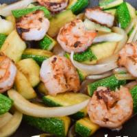 (H2) Hibachi Shrimp · Served with zucchini baby corn broccoli mushroom red pepper onion side of white rice or frie...