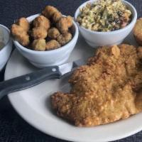 Country Fried Steak · With Vidalia onion gravy or white gravy and two sides.