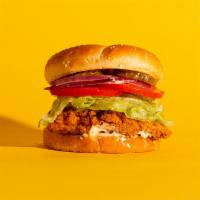 Fried Chicken Sandwich · Fried chicken with lettuce, tomato, pickles, onion and mayo on a fluffy bun.