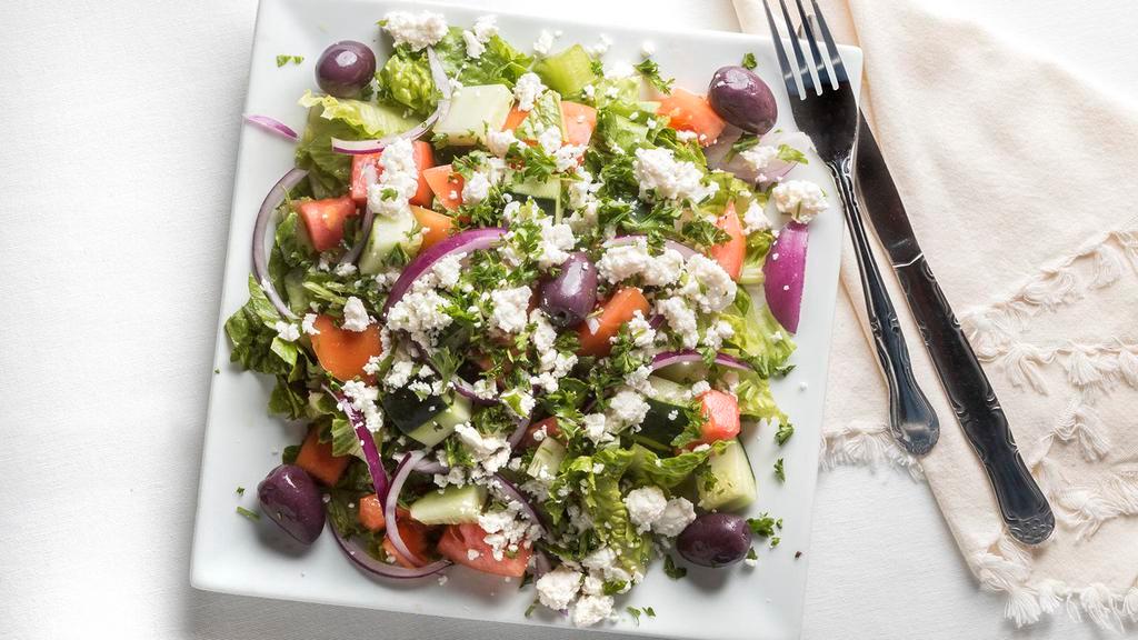 Greek Salad · Lettuce, tomato, cucumber onion, olive and fresh feta cheese.
