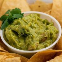 Chips & Guacamole · Fresh fried tortilla chips made to order and served with a side of guacamole.