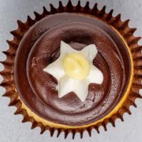 Boston Cream Pie · Six or 12 vanilla bean cupcakes, filled with Bavarian cream, topped with rich fudge icing.