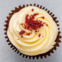 Famous Red Velvet · Six or 12 famous red velvet cupcakes, cream cheese frosting, topped with red velvet cake cru...