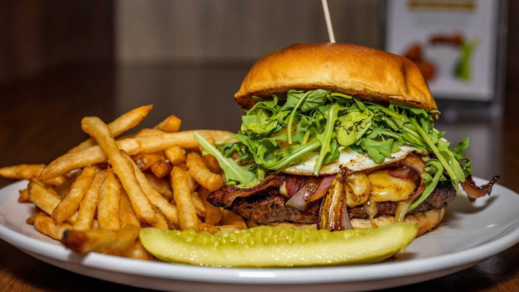 Major League Burger · ½ lb. beef patty, sunny side up egg, applewood smoked bacon, crumbled blue cheese, Swiss cheese, balsamic grilled onions, baby arugula, Duffy's burger sauce.
