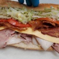 Turkey Club. · A trio of different meats in one sub. Ham, turkey, and fresh crispy bacon held in by slices ...