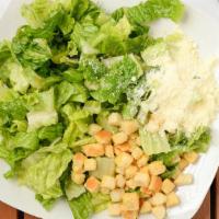 Caesar Salad · Romano cheese and croutons over Romaine lettuce with choice of dressing.