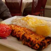 Chicken Kabob · A skewer of boneless chicken breast chunks marinated in a saffron sauce and charbroiled.