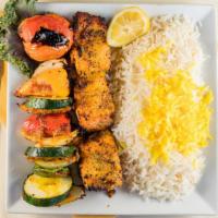 Fish Kabob · Charbroiled salmon fillet, seasoned with lemon saffron sauce and flavored with butter.