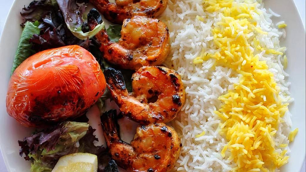 Shrimp Kabob · A skewer of jumbo shrimp marinated in a special sauce, seasoned with lemon saffron sauce and flavored with butter.