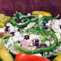 Greek Salad · Mixed greens, bell pepper, red onion, Roma tomato, sliced cucumber, kalamata olive, feta che...