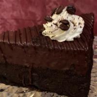 Cappuccino Cake Wedge · Chocolate chiffon cake layers filled with a rich cappuccino mousse and covered in chocolate ...