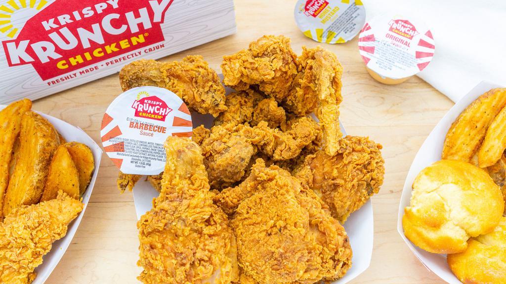 Family Meals - Chicken & Tenders · 6650 calories. 12 pieces chicken mix, six pieces Cajun tenders, six biscuits and Large side, and 2 sauces of your choice.
