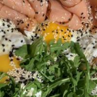 Salmon Quinoa Bowl · Organic quinoa, arugula, smoked salmon, 2 sunny side up organic eggs, avocado, scallions, se...
