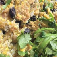 Latin Scramble · 3 organic eggs, organic brown rice, black beans, and topped with avocado, salsa, cilantro, a...