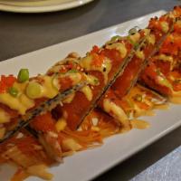 Spicy Tuna Pizza · Sushi rice stuffed in seaweed, flash fried with tempura battered topped with spicy tuna.

Co...
