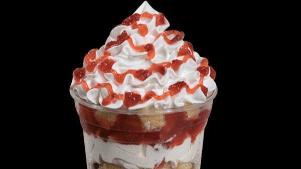 Strawberry Shortcake Sundae Dasher · Layers of vanilla ice cream, strawberries and pound cake topped with whipped cream and strawberry drizzle .