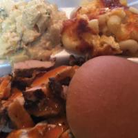 Chopped Chicken Plate · Chopped smoked chicken breast on a toasted bun or garlic toast and two side items. Smoked or...