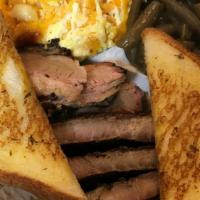 Brisket/Ribs Combo · Brisket, ribs comes with two sides and garlic toast.