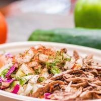 Beef Shawarma · Slices of seasoned certified Angus beef with your choice of lettuce, tomatoes, pickles, suma...