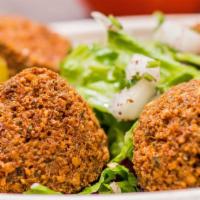 Falafel (Vegan) · Ground chickpeas, parsley, onion, spices, quickly deep-fried, served with lettuce, tomatoes,...