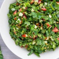 Tannour Salad · Chopped tomatoes, cucumber, onions, parsley marinated in lemon Tahini dressing.