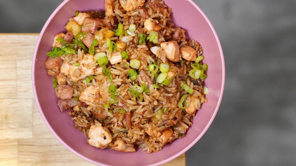 Jade Rice · Special fried rice with green onions, ginger, garlic, bacon, smoked ham, bean sprouts, baby shrimps, pineapple, egg, soy sauce.